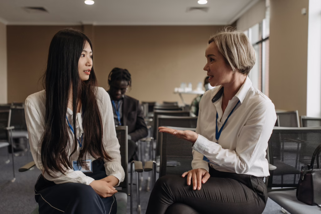 Marketing professionals participating in a mentorship discussion focused on career growth and workplace development